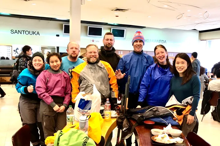 a group of people posing for a photo