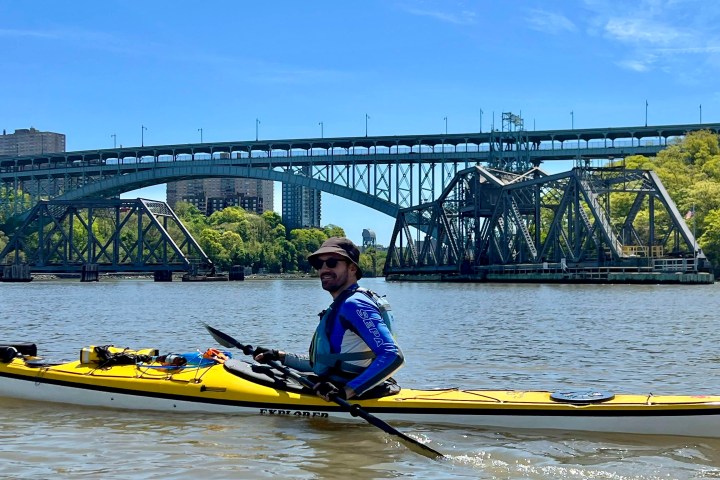 a person rowing a boat in the water