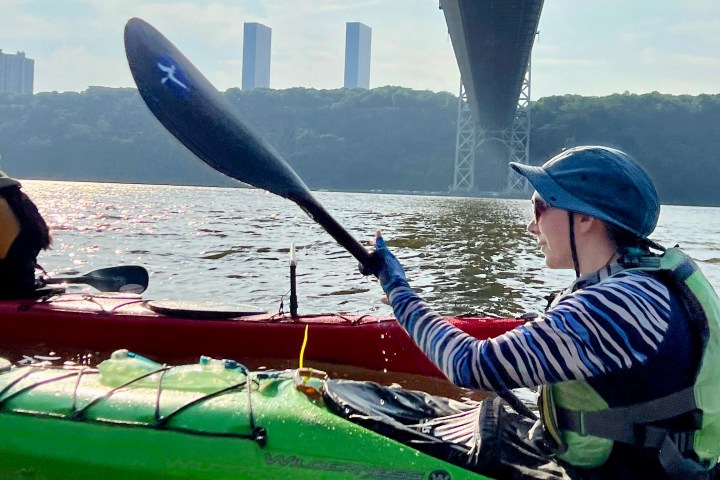 a small boat in a body of water
