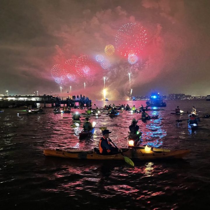 Kayakers watching July 4th fireworks on the Hudson River