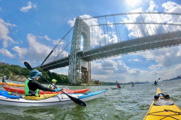 kayakers under the George Washington Bridge on the Hudson River