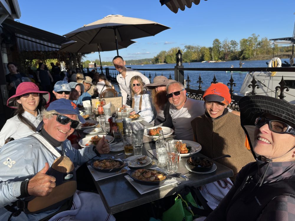 members at a table eating food