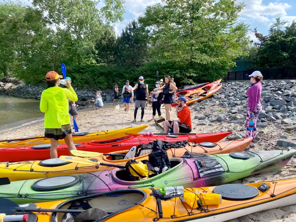 A group of sea kayakers taking a break at the Secret Beach.
