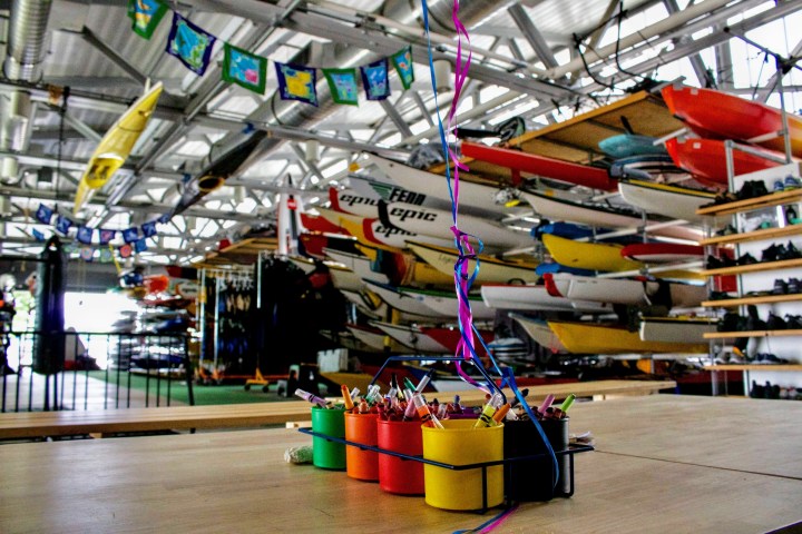 kayak on kayak racks inside our boathouse on the Hudson River