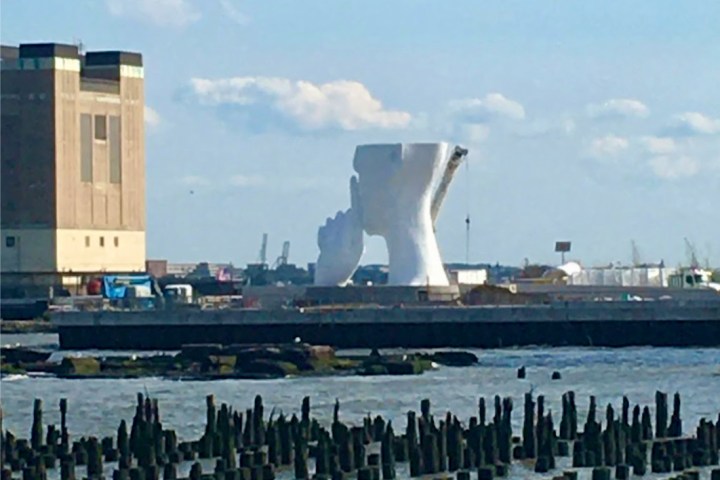a halfway done statue of a woman's face