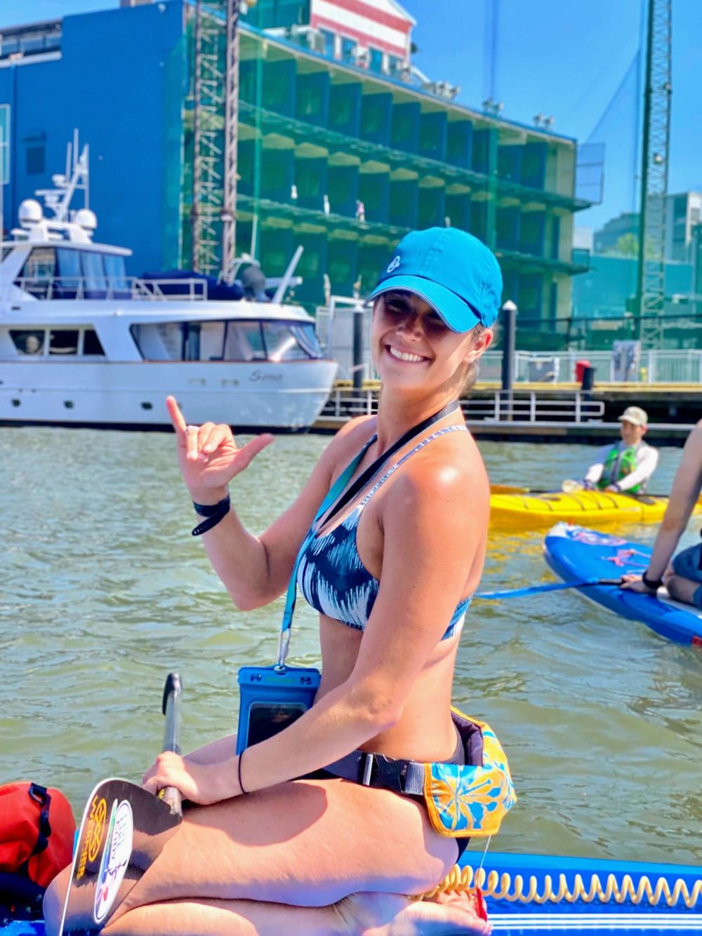 a person sitting on a boat in the water