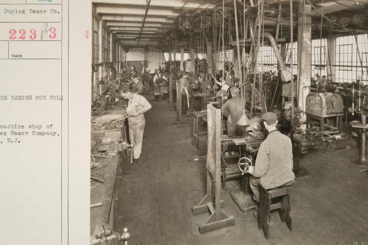 a group of people standing outside of a building