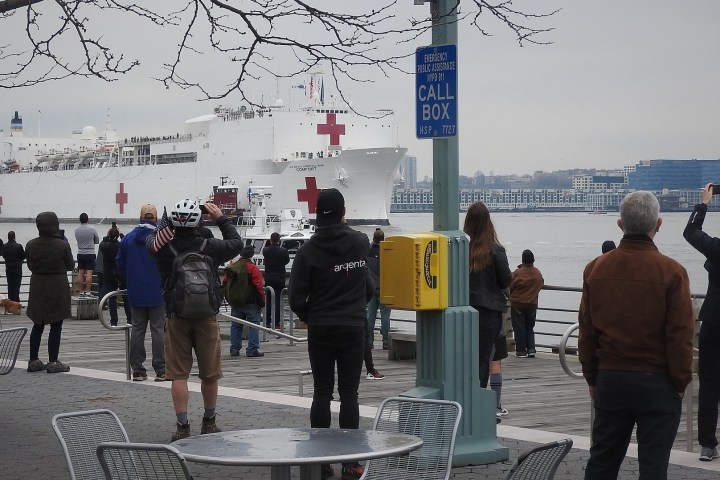 a group of people walking down the street