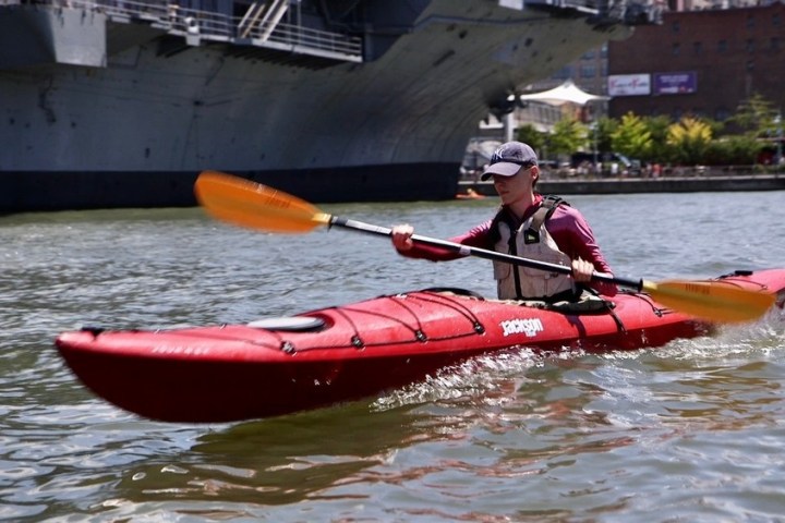 a small boat in a body of water