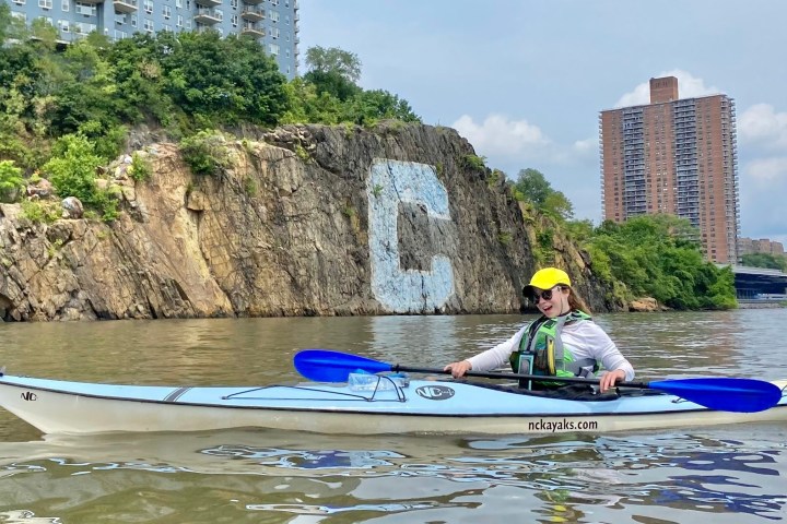 a person rowing a boat in the water