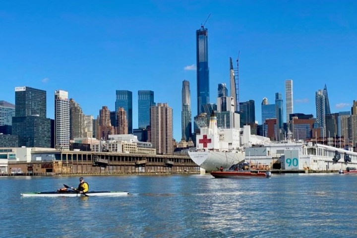 TRAK kayak in front of the USNS Comfort in NYC.