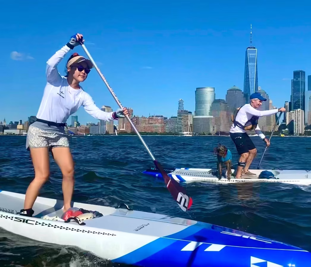 Stand up paddleboard fitness training on the Hudson River in New York City