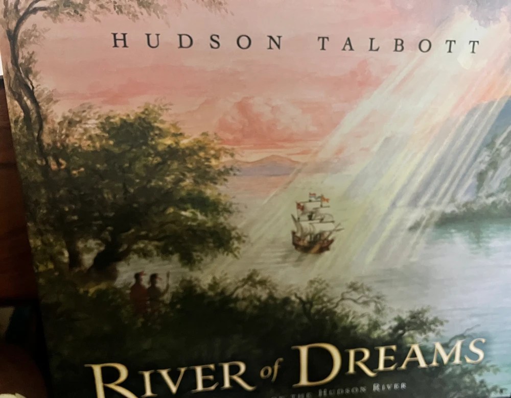 Cover of 'River of Dreams' book with a ship on a river and sun rays shining through clouds.