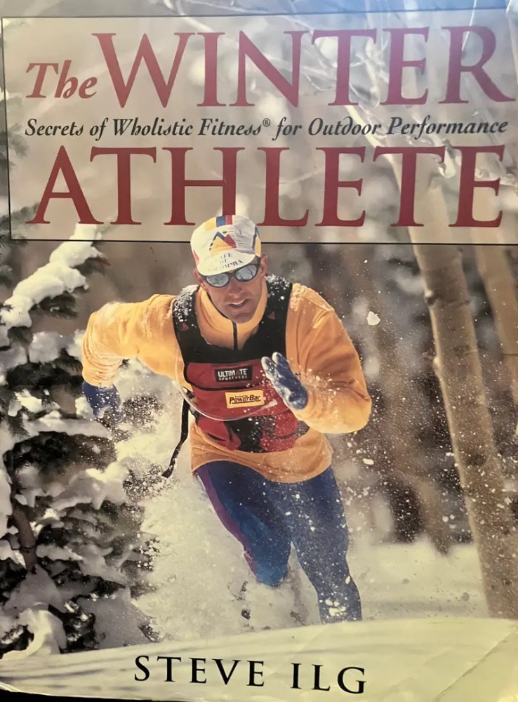 Cover of 'The Winter Athlete' book with a runner in snow.